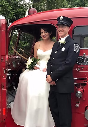 Our restored 1949 Mack is available for rentals. What a memorable wedding or reception event; a ride on a historic fire engine! This is the newly married couple of the Heaver/Hiltz wedding.